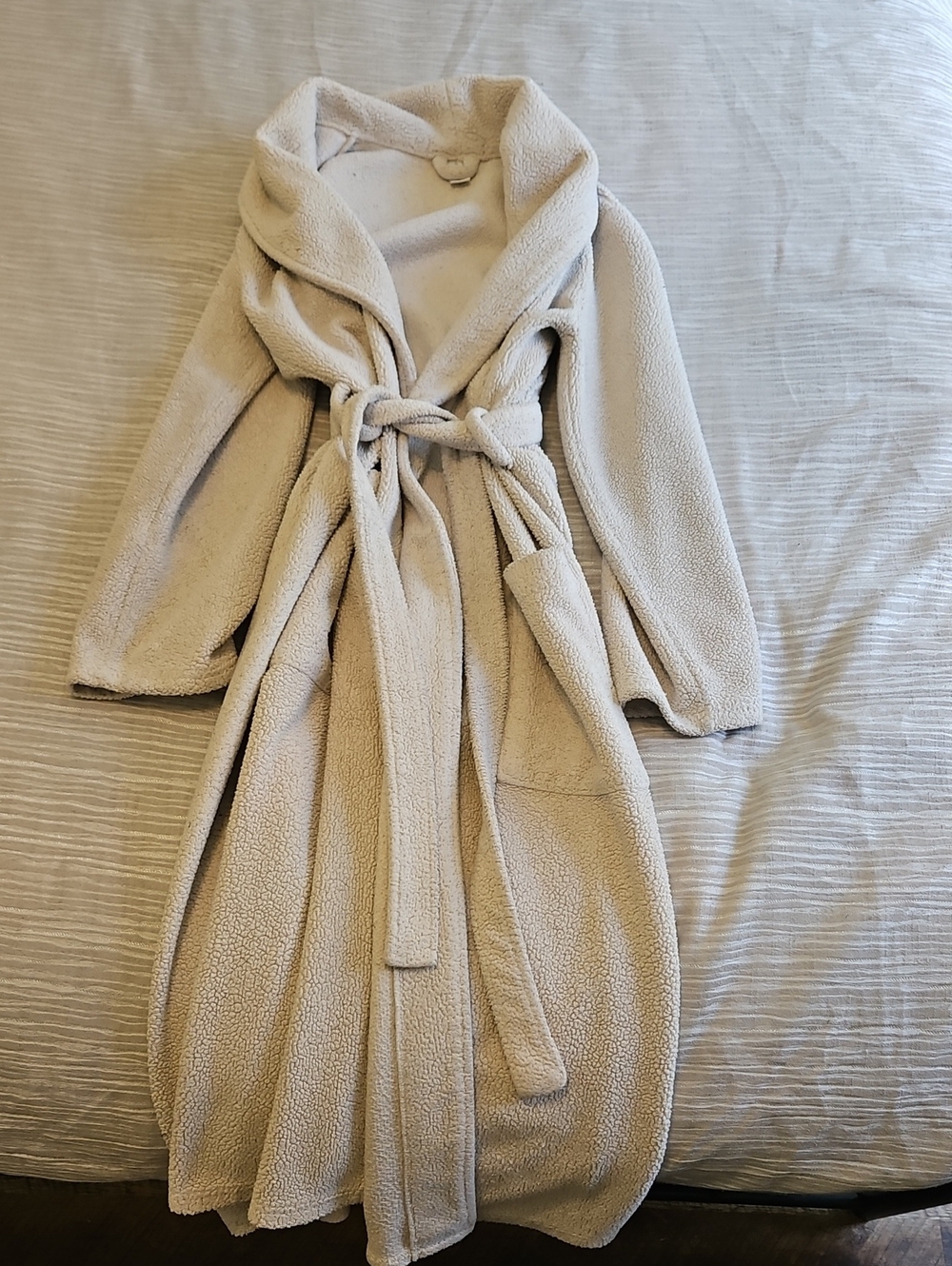 plush, sherpa-textured cream bathrobe